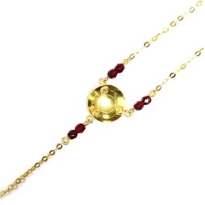 Main de Sarah Bâtée Grenat